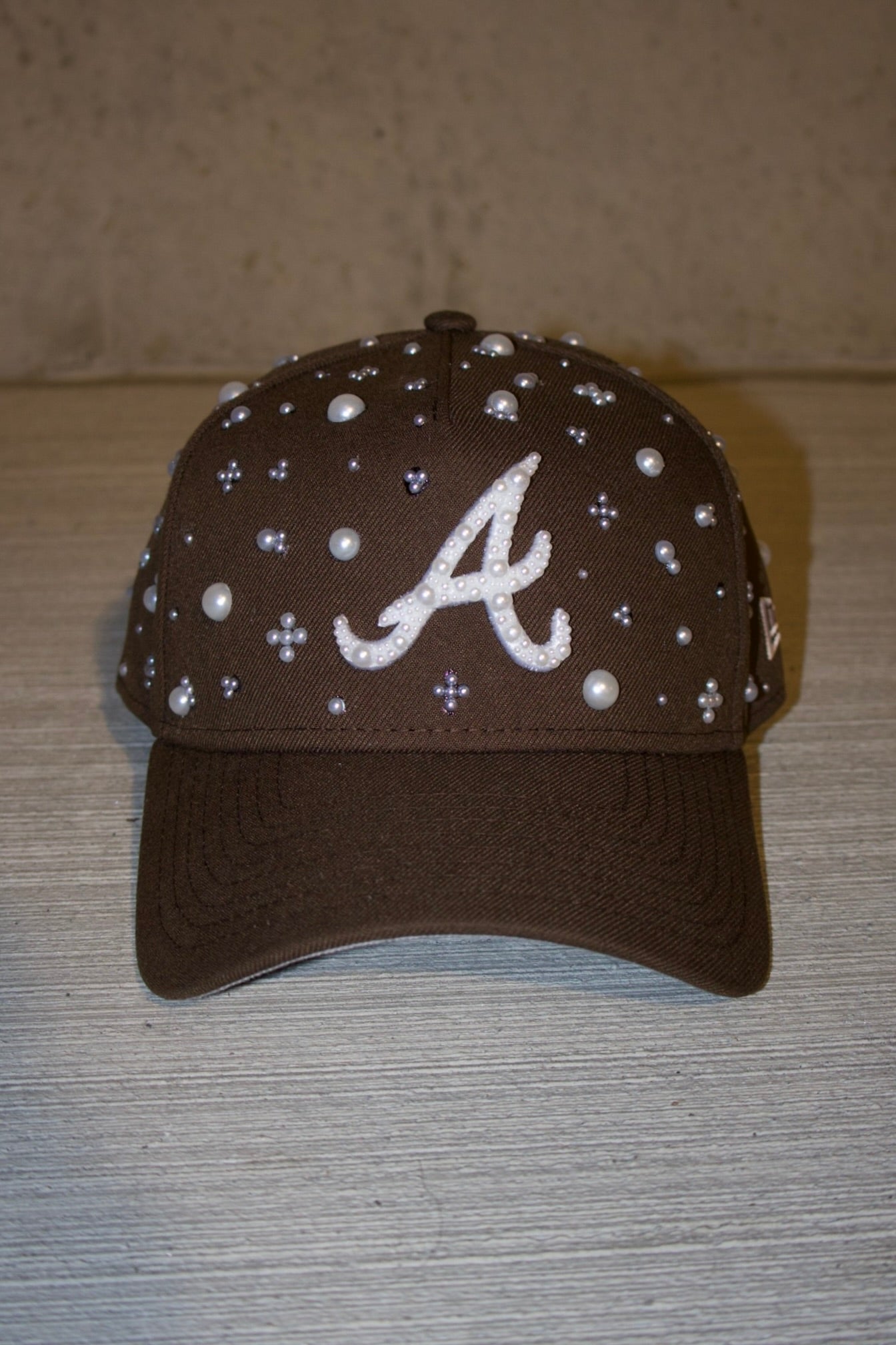 the "PEARL" hat