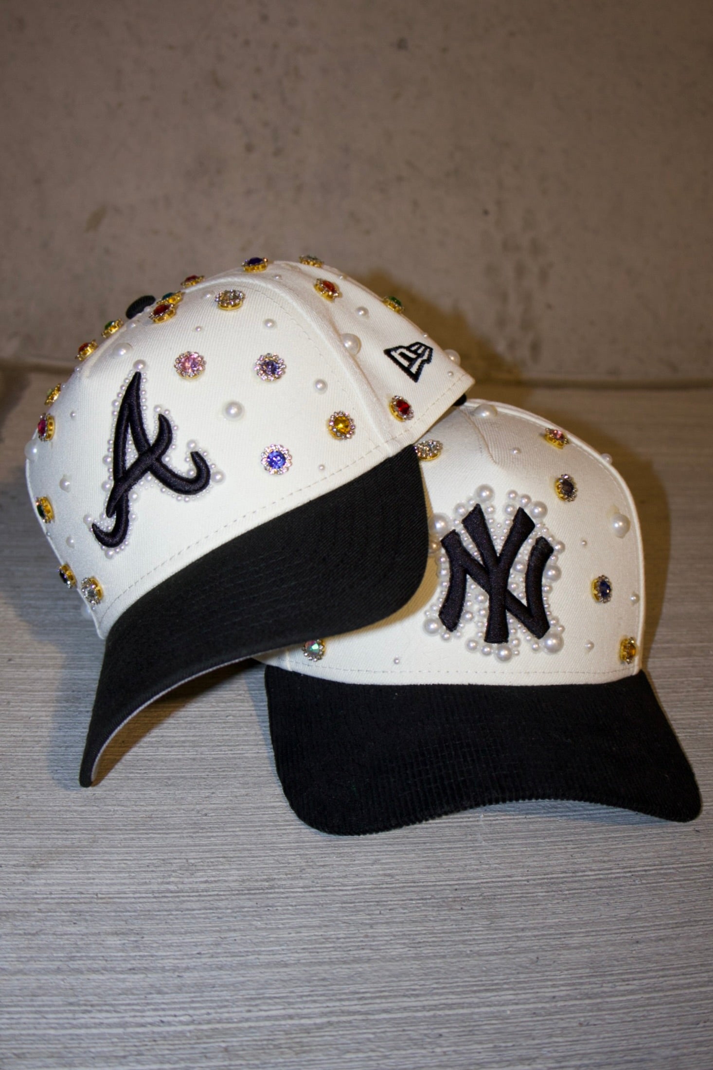 the "GEMS N PEARLS" hat
