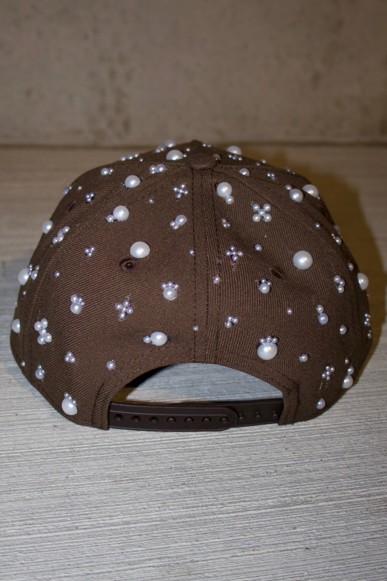 the "PEARL" hat